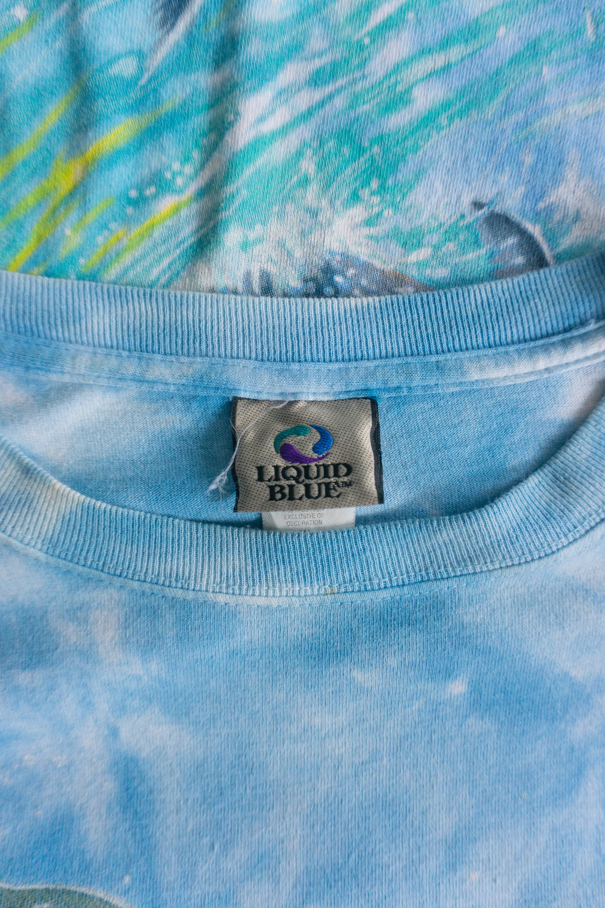 (XL) VINTAGE LIQUID BLUE DOLPHIN AOP OCEAN TEE