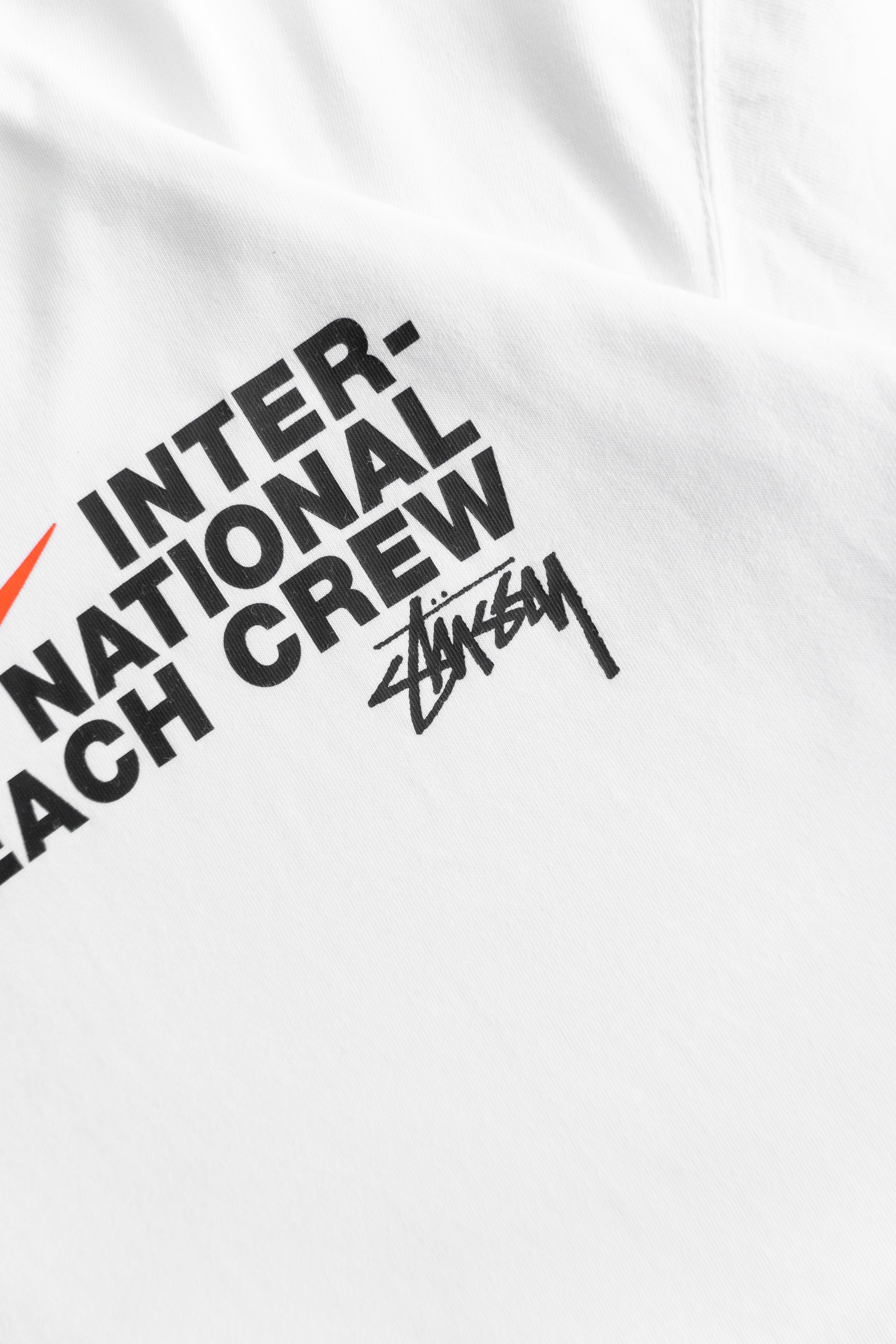 (L) NIKE X STÜSSY INTERNATIONAL BEACH CREW TEE