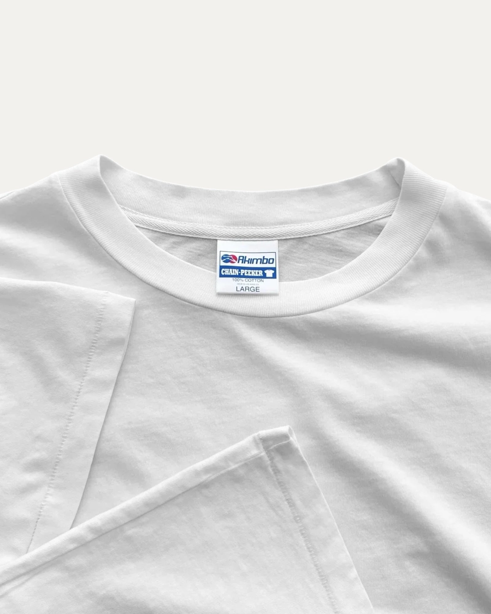 (L) AKIMBO BLANK SINGLE TEE