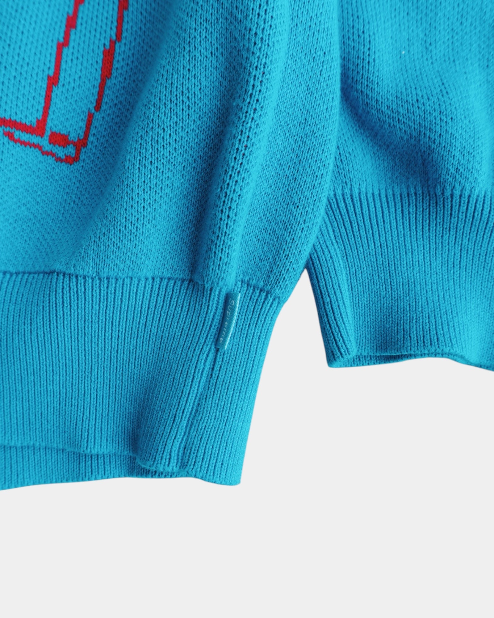 (L) SUPREME AEON FLUX CYAN SWEATER