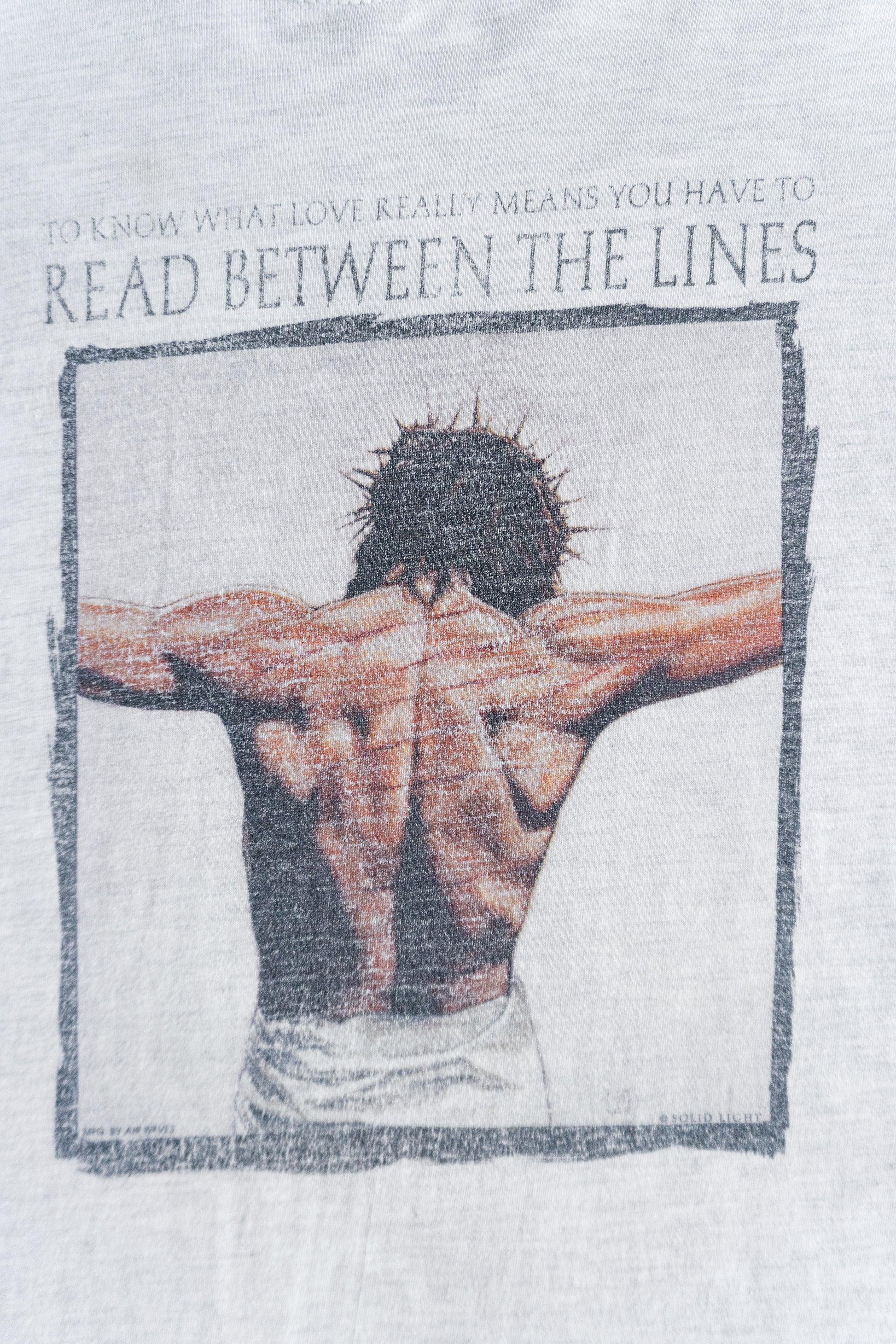 (L) 2000’S VINTAGE JESUS “READ BETWEEN THE LINES” TEE