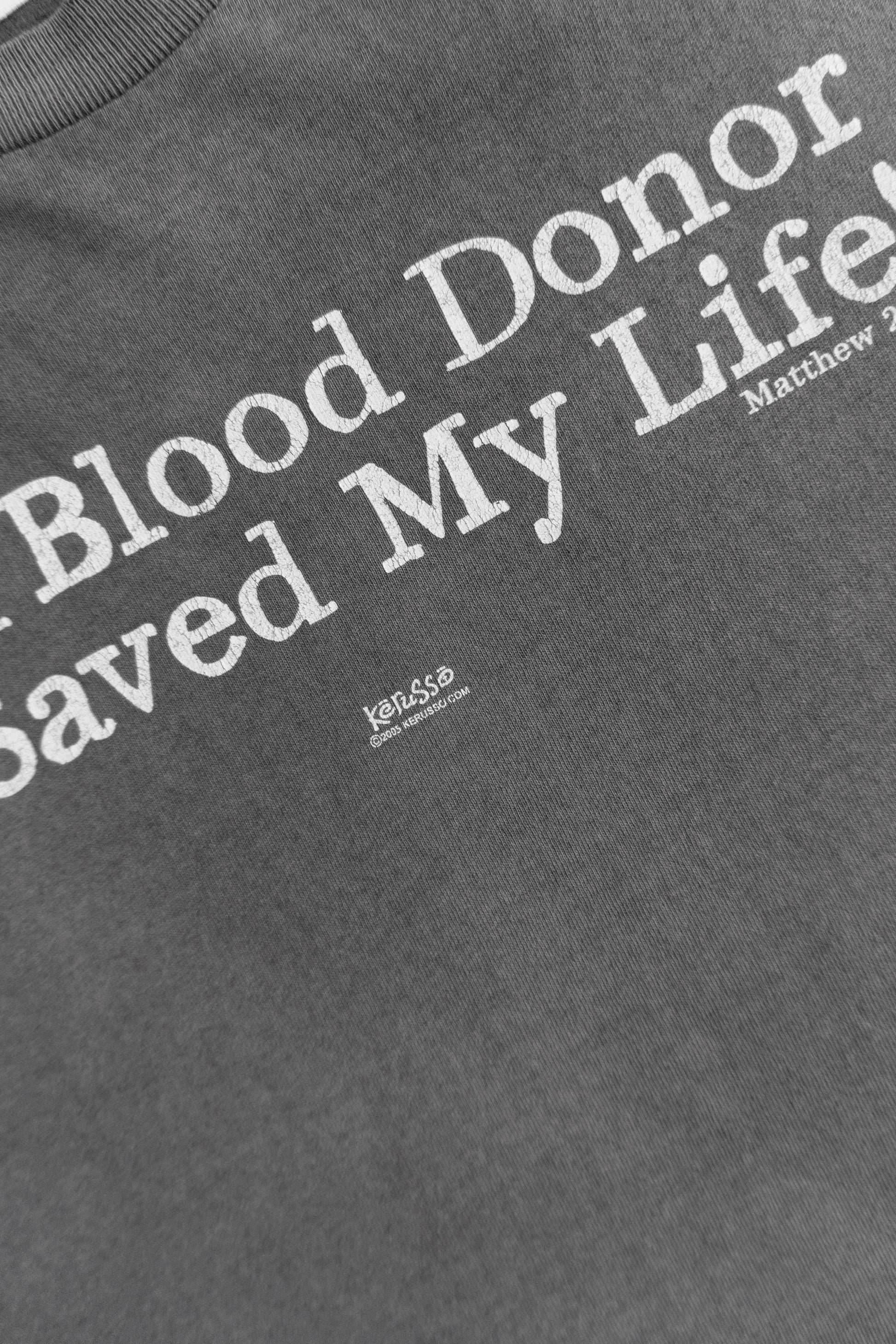 (L) 2000’S VINTAGE “A BLOOD DONOR SAVED MY LIFE” KERUSSO FADED JESÚS TEE